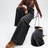 Pantalones negros de alta gama con dobladillo curvo para mujer, corte holgado, nuevos jeans de pierna ancha estilo europeo high street para la primavera-verano 2026