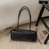 Bolsa Pequena Retro Texturizada de Luxo para Mulheres 2025 Novo Modelo Versátil Bolsa de Ombro para o Dia a Dia Bolsa de Mão Fashion Bolsa Baguette