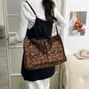 Bolsa Casual Estilo Leopardo em Lona para Mulheres 2026 Nova Moda Grande Capacidade Tote Ombro Transversal Bolsa de Maternidade