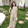 Conjunto de Verano 2026 Nuevo para Niñas de Seda de Hielo con Mangas Cortas y Diseño de Caída Conjunto de Dos Piezas para Niñas con Falda y Pantalones de Pierna Ancha