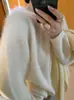 Suéter de alta calidad, corte holgado y cómodo, de mezcla de seda y lana, con cuello redondo, tejido en un color liso, una pieza básica para mujer en otoño.