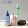 Botella de vidrio macaron de hombro plano 30 ml redonda recta esmerilada para dispensar aceite esencial con gotero para sérum, loción y cosméticos