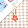Llavero con forma de campana de flor pequeña de estilo coreano, con pintura en color caramelo, llavero pequeño y fresco, bolso con colgante pequeño.