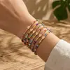 Comercio exterior transfronterizo superventas moda personalizada colorido cuentas de vidrio para semillas cordón elástico corazón colgante pulsera conjunto de varias piezas