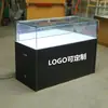 Mostrador de teléfono móvil productos de vidrio personalizados fabricante vitrina comercial gabinete de pared de madera gabinete de hierro con pintura horneada partición de rincón de joyería