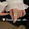 Anillo Plateado Brillante de Diseño Simple Coreano Plata de Ley S925 Estilo Ins Anillo de Corazón Hueco Texturizado para Mujer de Gama Alta