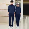 Directo del fabricante: Conjunto deportivo atlético para hombre de primavera/otoño, conjunto casual de sudadera y pantalones de chándal para hombre, cárdigan abierto, conjunto estilo estudiante