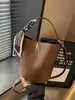Bolso de comercio exterior para mujer, bolso de cubo de mano retro simple, bolso cruzado de nicho de gran capacidad para el trabajo, bolso de hombro versátil para comercio transfronterizo