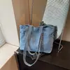 Nova bolsa de ombro retrô da moda transfronteiriça de grande capacidade, versão coreana, bolsa tote leve e estilosa para o dia a dia
