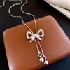 Accesorios de Collar con Borla de Lazo de Circonita Estilo Coreano para Mujer, Cadena de Suéter Moderna y Exquisita, Collar de Lujo Ligero y de Alta Gama