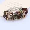 Pulsera de cuero de vaca con letra inglesa de aleación vintage estilo europeo y americano joyería para estudiantes pulsera de cuero para hombres y mujeres perdonado