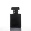 Fábrica en stock Botella de perfume Todo Negro 50ml 100ml botella de vidrio spray negro cosméticos sub-botella suministro directo
