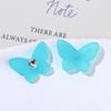 Parche de resina con forma de mariposa de diamantes de imitación, con pintura de goma esmerilada, para hacer pendientes, tocados, accesorios para el cabello, fundas para teléfono móvil, venta al por mayor