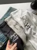 Camiseta de Manga Larga Bordada con Letras y Lazo Retro Suave de Primavera Estilo Coreano Falsa de Dos Piezas Copo de Nieve Algodón Camiseta Básica para Estudiante