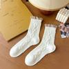 Meias estilo acadêmico outono e inverno meias de cano alto sem costura femininas absorventes de suor respiráveis algodão com relevo tridimensional meias de estudante vintage atacado