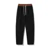Calça de Moletom Esportiva Masculina Outono Novo Estilo Street Style com Cordão Solta Calça Casual Longa de Veludo Cotelê Reto Estilo Retro Americano