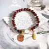Nueva pulsera de esmalte de mariposa femenina ins nicho lujo ligero Mori azul marino cuentas de colores craqueladas hielo pulsera de amigas al por mayor