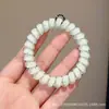 Goma para el pelo de alambre de teléfono con estampado de leopardo retro, alta elasticidad, banda de goma sin marcas para adultos, adecuada para coletas, simple y elegante, no daña el cabello