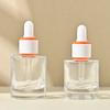 Botella de esencia líquida de patente con veta plateada de 30 ml, fondo grueso, doble anillo naranja blanco, botella de aceite esencial de 40 ml, botella cilíndrica con gotero