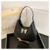 Bolso axilar con lazo lindo de moda popular de este año 2024 verano nuevo bolso de hombro para damas bolso de mano de color sólido