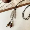 2025 Cuerda trenzada retro hoja pez gordo borla atmósfera de otoño collar borla collar elegante