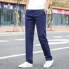 Calça casual de alta qualidade cinza claro para homens, corte reto solto, calça de outono, novo modelo primavera/outono 2026, tamanho grande, comprimento longo
