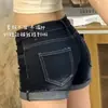Short jeans hot pants sexy estilo americano de cintura baixa ultra-curto para mulheres, design azul escuro de verão com bordas dobradas