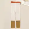 Meias Infantis 2026 Outono Nova Cor Color Block Calça Nove Pontos Costura de Cor Contrastante Leggings para Meninas para Uso ao Ar Livre