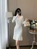 Elegante vestido de punto estilo coreano para mujer, otoño e invierno, corte ajustado, que se ciñe a la cadera, capa base, suéter, falda de cola de pez