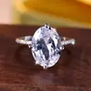 Anel Rongxing Cross-Border de Luxo Leve com Quatro Garras, Pedra Principal Oval, Aro Fino com Pedras Incrustadas, Anel Aberto para Jantar de Gala Feminino, Proposta
