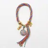Cuerda de mano tejida a mano thangka de Xizang ocho santos patrones thangka cuerda de mano tejida a mano cuerda de mano de hilo de algodón multicolor marea nacional