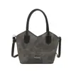 Los bolsos retro populares para mujer de este año son versátiles para el otoño de 2026, presentando nuevos bolsos de hombro único, cruzados y tipo cubo