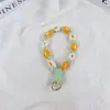Llavero Colgante de Cordón con Flor de Margarita Pequeña Transfronteriza, Cordón Corto Artístico y de Moda, Cuerda Tejida de Margarita Pequeña