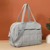 Bolsa de Viaje Portátil Ligera de Gran Capacidad para Salidas Cruzada Casual Ligera Diseño de Nicho Almacenamiento de Mano Bolsa de Fitness Bolsa de Viaje