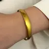 Set de Pulseras Doradas de Acero Inoxidable Estilo Retro con Diseños Geométricos, Pluma, Estrella y Serpiente, Pulseras Abiertas para Apilar