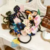 Diadema con orejas de conejo estilo coreano accesorios para el cabello cuerda para el cabello al por mayor Taobao pequeño regalo regalo para actividad de empresa liga para el cabello banda de goma