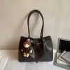 Bolso Retro de Gamuza de Gran Capacidad 2025 Otoño e Invierno Nuevo Bolso de Hombro para Viajar Bolso Tote de Mano para Mujer