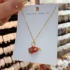 Nuevos Pendientes de Calabaza Pintados con Esmalte Chino 2024 Nuevo Oro Arenoso Estilo Guofeng Gancho para la Oreja Lujo Ligero Pendientes Elegantes de Gama Alta