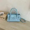 2026 Nuevo Bolso con Patrón de Lichi Hebilla de Cuero Bolso de Hombro para Viajes Cotidianos Simple de Hombro Cruzado Bolso de Temperamento para Mujer