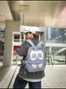 Mochila retro de gran capacidad para mujer, nuevo modelo 2026, diseño de bloques de color de nicho, tacto de alta gama, adecuada para viajes y como mochila escolar