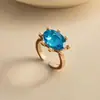 Anillo abierto ovalado con incrustaciones de diamantes transfronterizo europeo y americano, diseño simple y elegante, anillo exquisito y versátil para el dedo índice para mujer