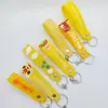 Llavero de silicona color caramelo cuerda de cuero gota de PVC mano con accesorio de cordón pegamento suave colgante con LOGOTIPO impreso venta al por mayor