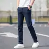 Calça casual para reparo de carro masculina outono novo todas as estações moda marca Cinza calça de trabalho Primavera e Outono Business solta reta calças