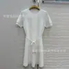 Vestido de malha feminino de manga curta com gola redonda fina, cadarço, cor sólida, 26 Primavera/Verão, versão alta correta transfronteiriça, para casa