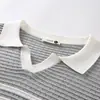 Polo de punto para hombre, una pieza lujosa y sofisticada para el estilo business casual, con un diseño calado, tejido transpirable y estilo de manga corta con cuello.