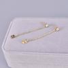 Pendientes de cadena sencilla con colgante trasero de oro de 18 quilates y acero de titanio E75 para hombre y mujer, estilo retro sencillo de puerto callejero con pequeños diamantes.