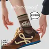 Tejido liso, engrosado para otoño e invierno, calcetines de algodón para mujer, longitud a media pantorrilla, estilo de mujer, rayas de bloques de color, estilo preppy, deportivo y casual coreano