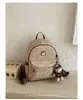 Mochila Feminina Retrô de Luxo 2026 Nova Versátil para o Dia a Dia Exquisite Super Popular Grande Capacidade Pequena Mochila Escolar