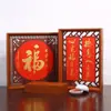 Colgante de Papel de Arroz Wan Nian Hong Marco de Fotos de Madera Hueca Decoración de Año Nuevo Chino Creación de Caligrafía Tarjeta Rígida Venta al por Mayor