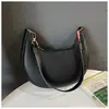 Bolsa de Ombro Nova Moda Verão 2025 Bolsa Simples de Meia-Lua Bolsa para o Trabalho Personalidade Francesa Sob o Braço Bolsa Feminina
